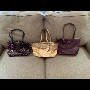 Three Coach purses